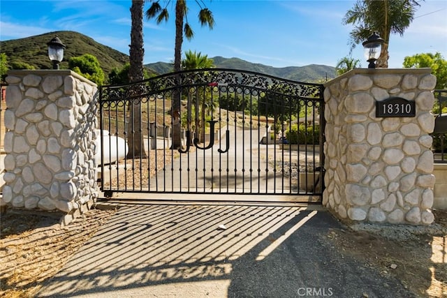 18310 Canon St, Devore, CA 92407 - gate featuring a mountain view