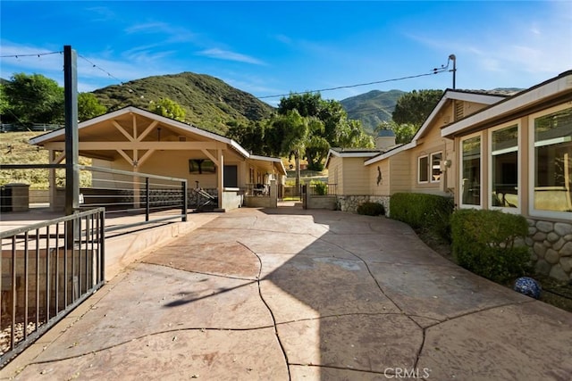 18310 Canon St, Devore, CA 92407 - view of patio / terrace with a mountain view
