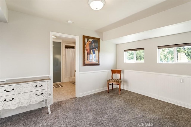 18310 Canon St, Devore, CA 92407 - living area featuring carpet flooring and wainscoting