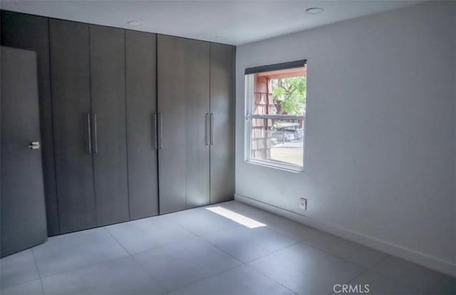 2727 Pine Creek Cir, Fullerton, CA 92835 - unfurnished bedroom featuring light tile patterned floors