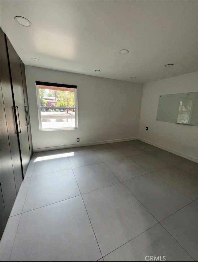 2727 Pine Creek Cir, Fullerton, CA 92835 - tiled empty room with recessed lighting