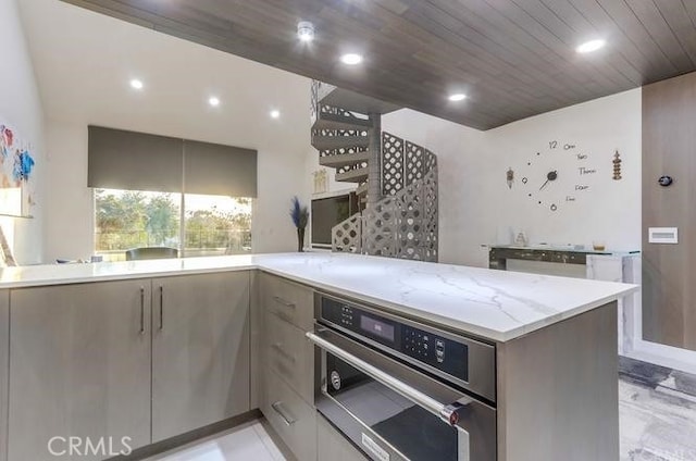 2727 Pine Creek Cir, Fullerton, CA 92835 - kitchen with oven, light stone counters, and recessed lighting