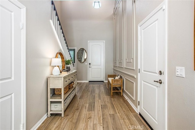 849 Half Moon Ave, Redlands, CA 92374 - foyer with light wood-style flooring