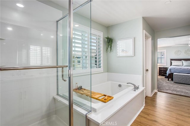 849 Half Moon Ave, Redlands, CA 92374 - bathroom with healthy amount of natural light, a bath, ensuite bathroom, and a shower stall