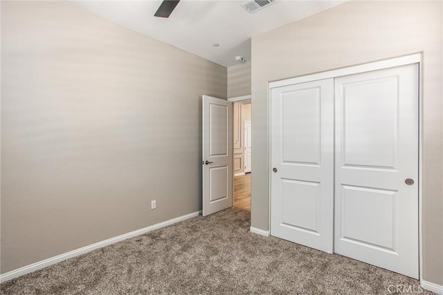 849 Half Moon Ave, Redlands, CA 92374 - unfurnished bedroom with carpet flooring, a closet, and a ceiling fan