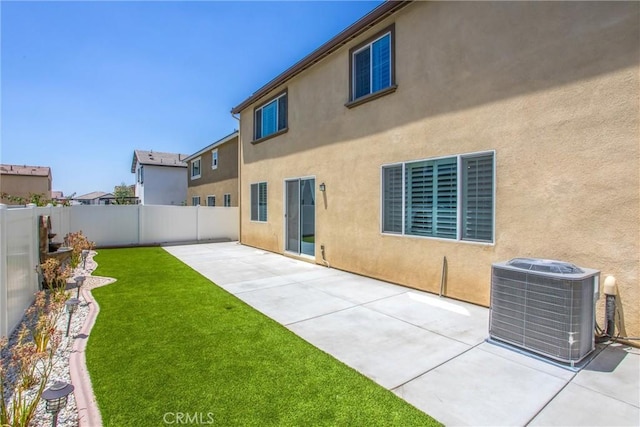 849 Half Moon Ave, Redlands, CA 92374 - back of house with a fenced backyard, a patio, and stucco siding