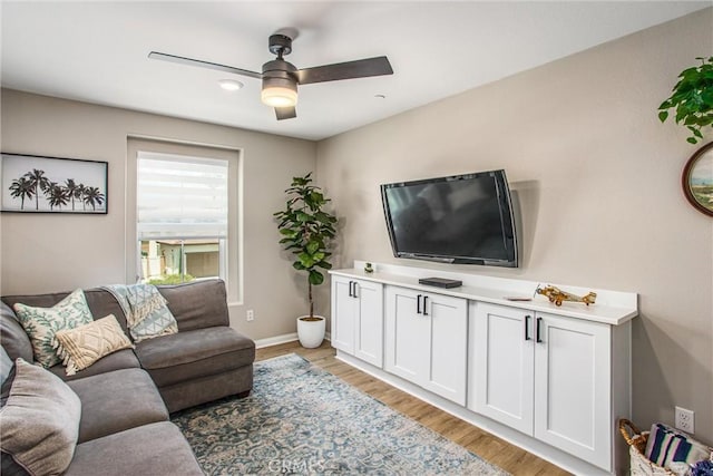 849 Half Moon Ave, Redlands, CA 92374 - living room with a ceiling fan and light wood-style flooring