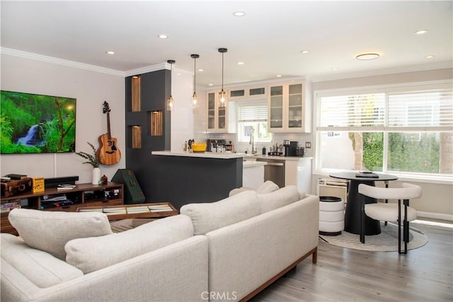 972 Larrabee St Unit 119, West Hollywood, CA 90069 - living area featuring light wood-style flooring, crown molding, and recessed lighting
