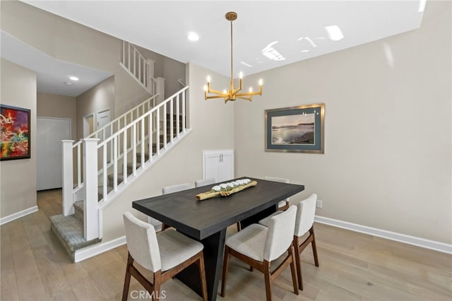 22 Brassie Ln, Coto De Caza, CA 92679 - dining space featuring light wood finished floors, stairs, a chandelier, and recessed lighting