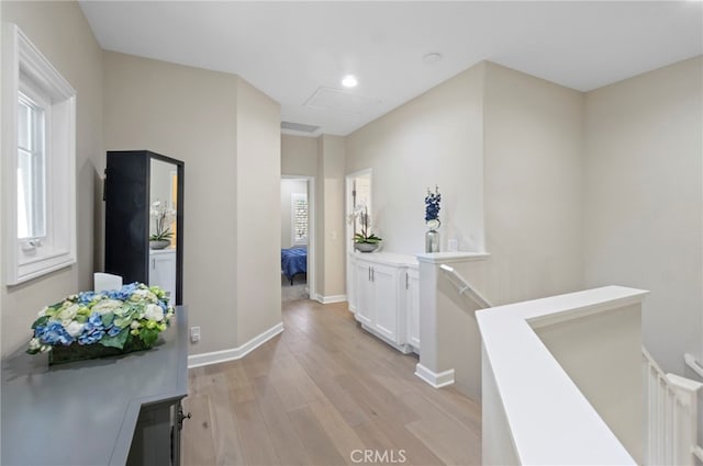 22 Brassie Ln, Coto De Caza, CA 92679 - corridor featuring an upstairs landing and light wood-style floors