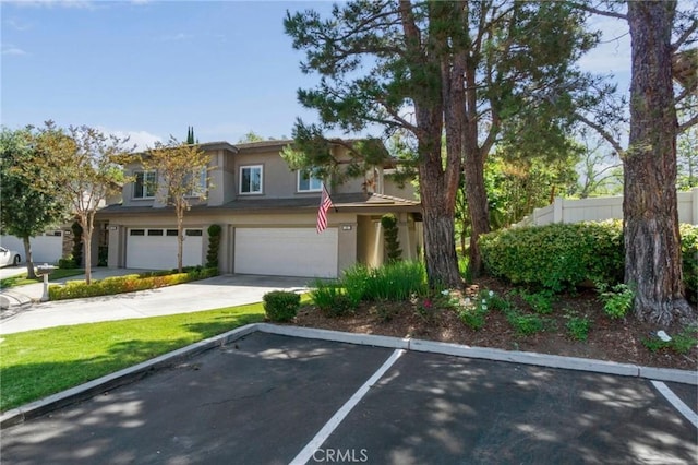 22 Brassie Ln, Coto De Caza, CA 92679 - view of front of home featuring stucco siding and an attached garage