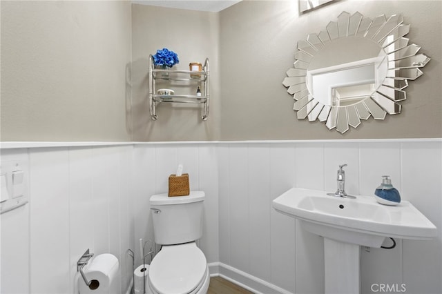 22 Brassie Ln, Coto De Caza, CA 92679 - bathroom with a wainscoted wall and a decorative wall