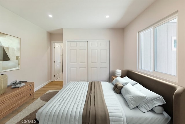 456 E 61st St, Long Beach, CA 90805 - bedroom with wood finished floors, a closet, and recessed lighting