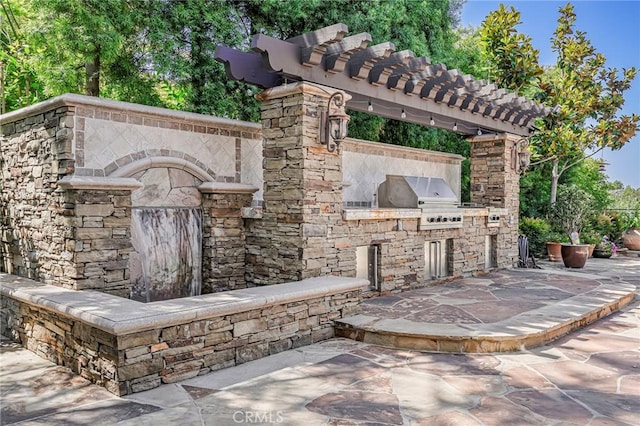 25291 Derbyhill Dr, Laguna Hills, CA 92653 - view of patio / terrace with an outdoor kitchen and a pergola