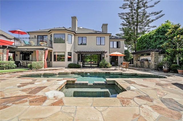 25291 Derbyhill Dr, Laguna Hills, CA 92653 - rear view of property featuring a balcony, stucco siding, a pergola, a patio, and a chimney