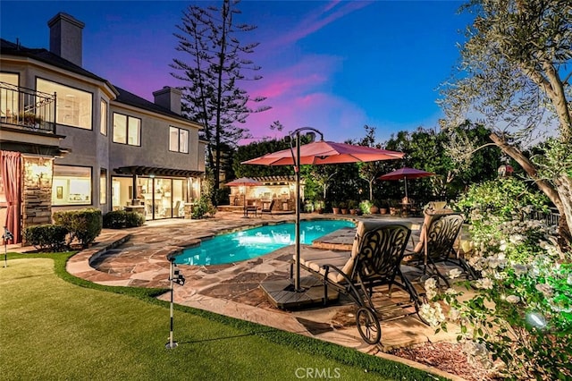 25291 Derbyhill Dr, Laguna Hills, CA 92653 - pool at dusk with a patio area and an outdoor pool