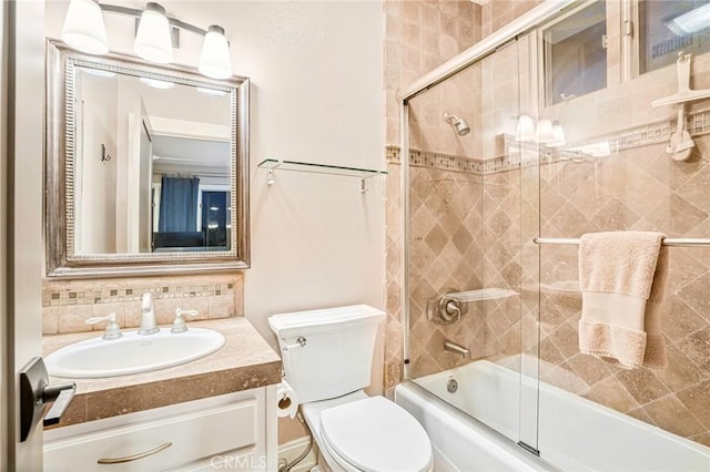 25291 Derbyhill Dr, Laguna Hills, CA 92653 - full bath with vanity, combined bath / shower with glass door, and tasteful backsplash