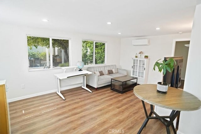 5525 Costello Ave, Sherman Oaks, CA 91401 - living room featuring an AC wall unit, light wood-style floors, and recessed lighting