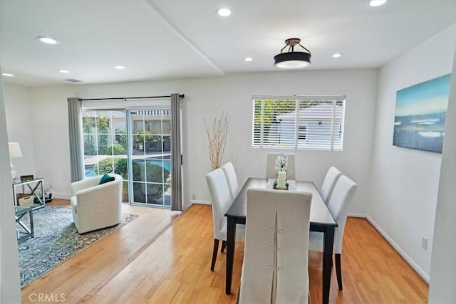 5525 Costello Ave, Sherman Oaks, CA 91401 - dining space with wood finished floors and recessed lighting