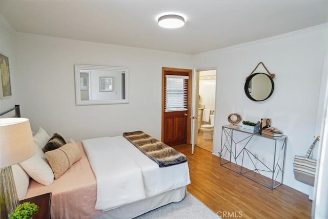 5525 Costello Ave, Sherman Oaks, CA 91401 - bedroom with wood finished floors and ensuite bathroom