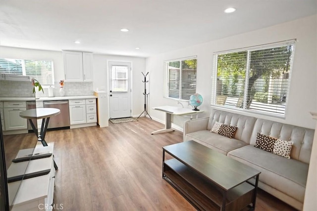 5525 Costello Ave, Sherman Oaks, CA 91401 - living area with plenty of natural light, light wood finished floors, and recessed lighting