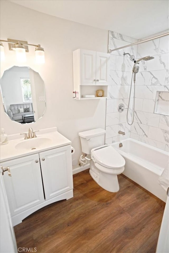 5525 Costello Ave, Sherman Oaks, CA 91401 - full bath with vanity, washtub / shower combination, and wood finished floors