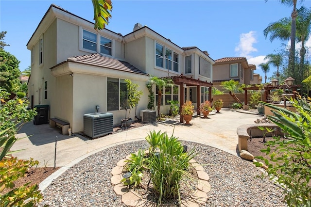 2 Shadow, Irvine, CA 92620 - rear view of house featuring a patio area, a tiled roof, and stucco siding