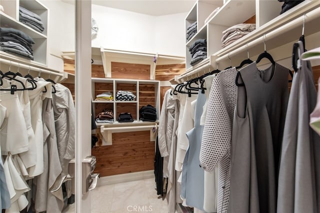 2 Shadow, Irvine, CA 92620 - walk in closet featuring marble look tile flooring