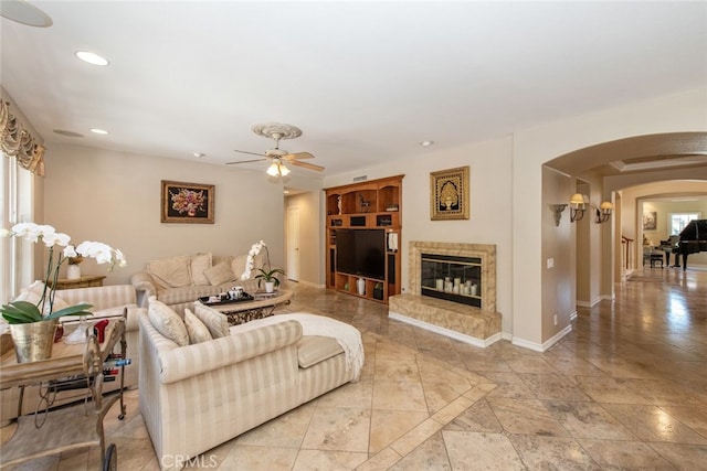 2 Shadow, Irvine, CA 92620 - living area featuring arched walkways, a ceiling fan, recessed lighting, and a fireplace