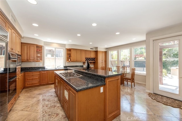 2 Shadow, Irvine, CA 92620 - kitchen featuring open shelves, appliances with stainless steel finishes, a center island, recessed lighting, and dark stone countertops