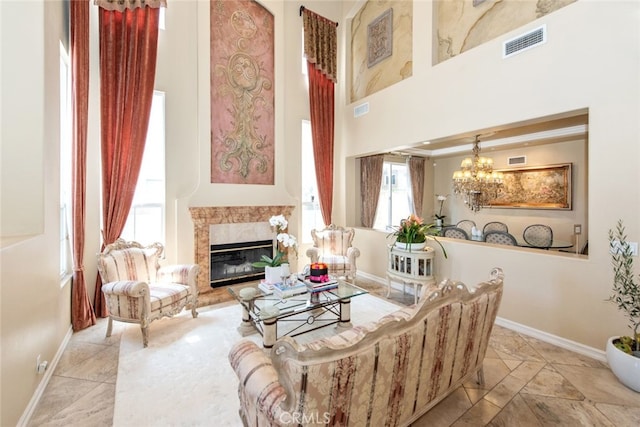 2 Shadow, Irvine, CA 92620 - living area featuring a chandelier, a premium fireplace, and a high ceiling