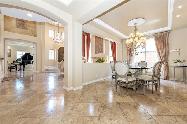 2 Shadow, Irvine, CA 92620 - dining room with a chandelier, arched walkways, a tray ceiling, crown molding, and recessed lighting