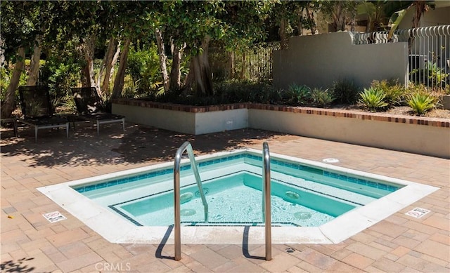 3 Longbourn Aisle, Irvine, CA 92603 - view of swimming pool featuring a pool, a hot tub, and a patio