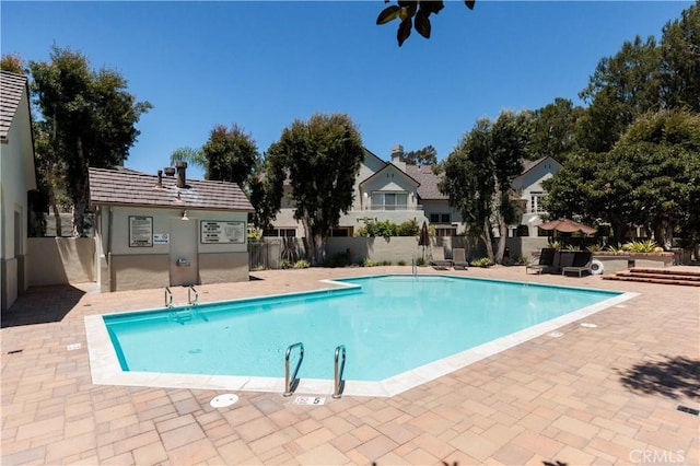 3 Longbourn Aisle, Irvine, CA 92603 - community pool featuring a patio