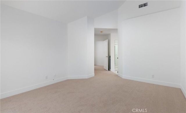 3 Longbourn Aisle, Irvine, CA 92603 - empty room featuring light carpet and vaulted ceiling