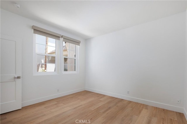 3 Longbourn Aisle, Irvine, CA 92603 - unfurnished room with light wood-style floors and a smoke detector