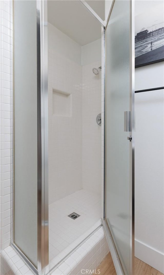 3 Longbourn Aisle, Irvine, CA 92603 - full bath featuring a stall shower and wood finished floors