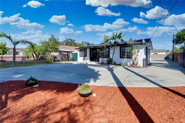 3310 Mangum St, Baldwin Park, CA 91706 - ranch-style house with concrete driveway and stucco siding