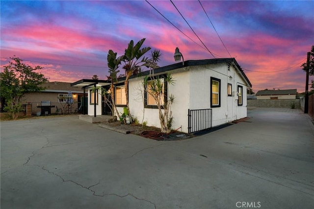 3310 Mangum St, Baldwin Park, CA 91706 - view of front of house featuring stucco siding and concrete driveway