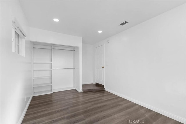 3310 Mangum St, Baldwin Park, CA 91706 - unfurnished bedroom with dark wood-type flooring, a closet, and recessed lighting