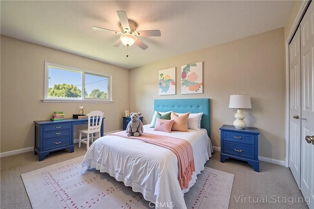 2601 Hoover Ct, Merced, CA 95340 - bedroom with a closet, light colored carpet, and a ceiling fan