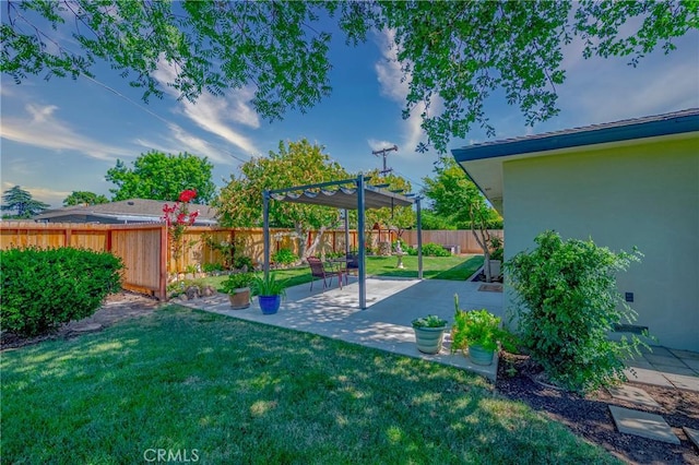 2601 Hoover Ct, Merced, CA 95340 - fenced backyard with a pergola and a patio area