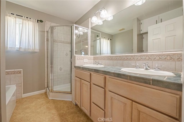 2601 Hoover Ct, Merced, CA 95340 - full bath featuring a shower stall, double vanity, and a bath