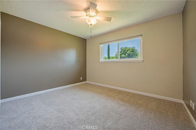 2601 Hoover Ct, Merced, CA 95340 - empty room with carpet flooring, a ceiling fan, and a textured ceiling