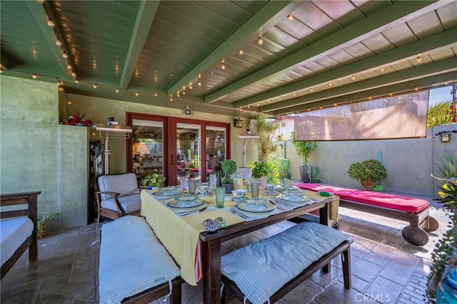 5837 Los Arcos Way, Buena Park, CA 90620 - dining room with stone tile floors and a wood ceiling with exposed beams