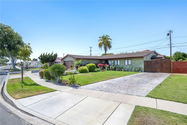 5837 Los Arcos Way, Buena Park, CA 90620 - ranch-style house featuring driveway, a gate, and stucco siding