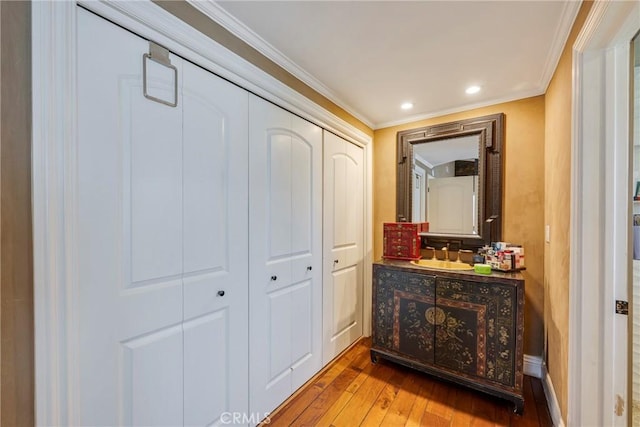 5837 Los Arcos Way, Buena Park, CA 90620 - hall featuring wood-type flooring, ornamental molding, and recessed lighting