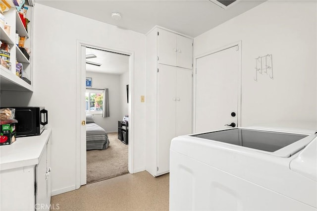 886 Lynn Ln, Chico, CA 95926 - laundry room featuring washing machine and clothes dryer and cabinet space