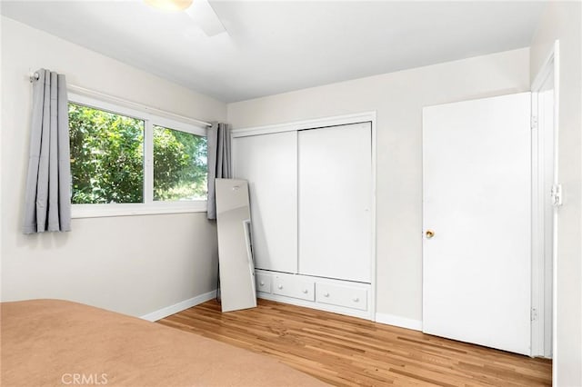 886 Lynn Ln, Chico, CA 95926 - unfurnished bedroom featuring wood finished floors and a closet