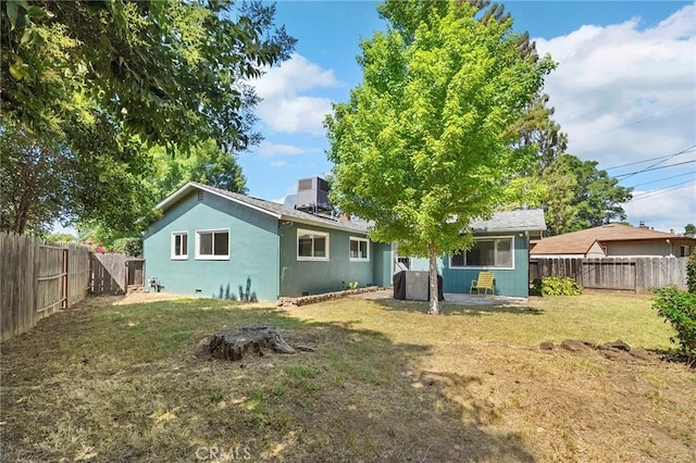 886 Lynn Ln, Chico, CA 95926 - rear view of house featuring a fenced backyard and stucco siding